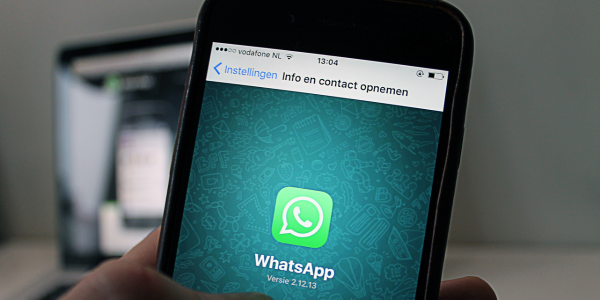 Phone showing Pink WhatsApp Scam
